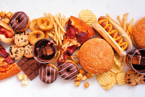 Ultra-processed foods, such as pizza, french fries chips donuts, cookies and onion rings