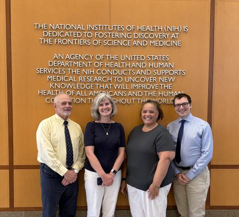 Group shot of Introne with colleagues in Clinical Center