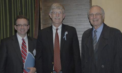 Burklow, Collins, Alda pose together.