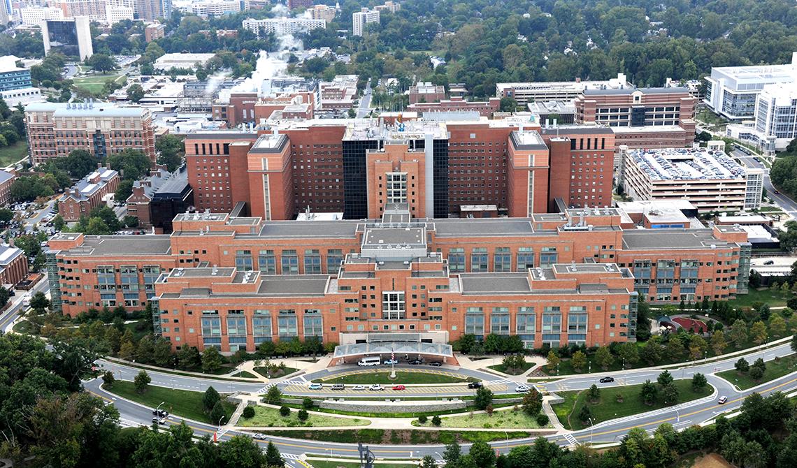 An aearial view of NIH main campus with the Clinical Center in the foreground.