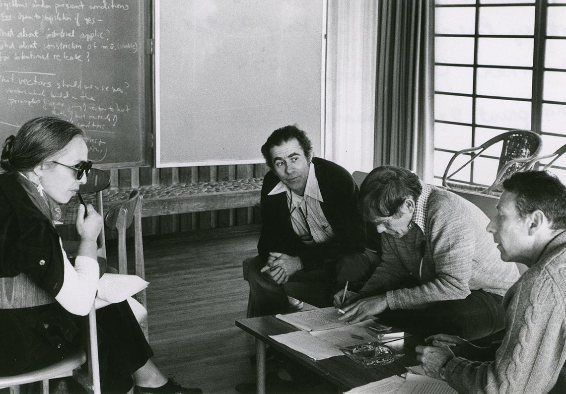 Four Asilomar conference attendees sit around a coffee table
