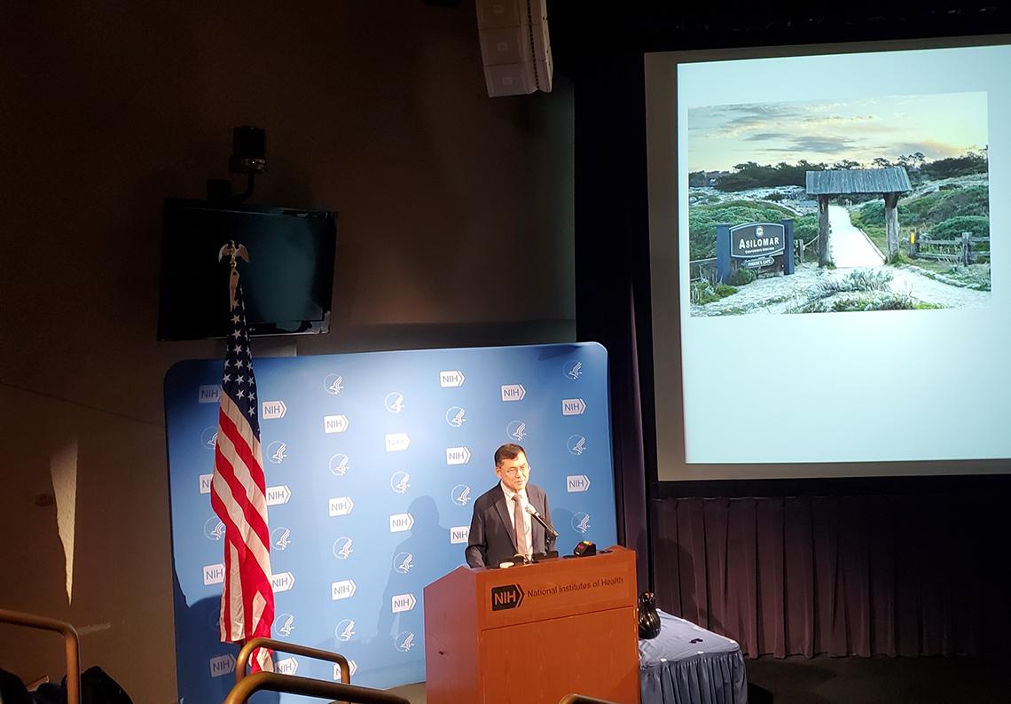 Park speaks a podium