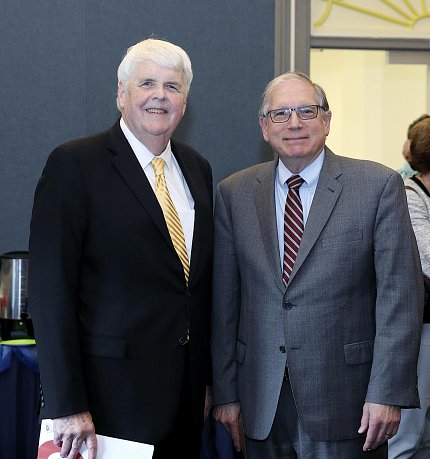 Tony Clifford and Dr. Lawrence Tabak Clifford stands smiling with Tabak