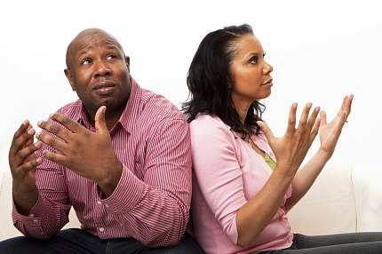 Sex differences in brain anatomy A man and a woman hold their hands up looking frusterated