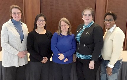 Diversity Warriors Five women side-by-side smile for camera